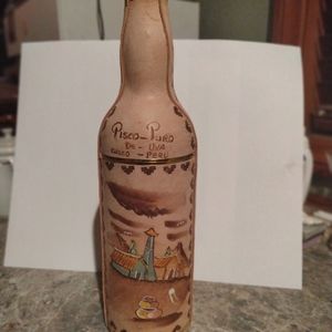 Vintage leather pisco bottle from Peru